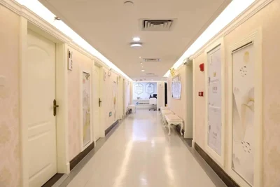 A corridor with doors to examination rooms.