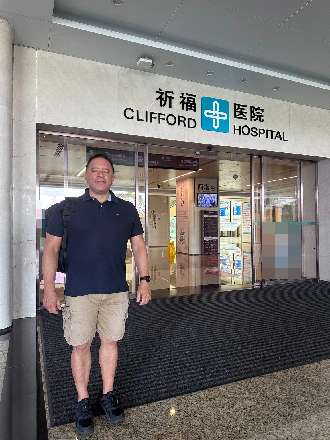 Gus at the entrance to Guangdong Clifford Hospital in Guangzhou